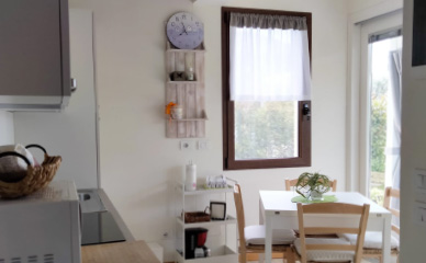 Zona giorno con cucina e sala da pranzo Villetta Gelsomino Bardolino